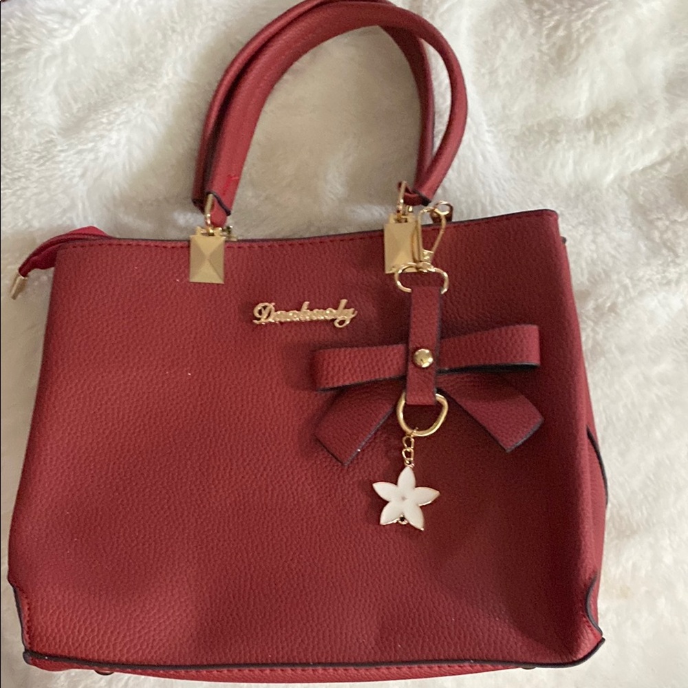 Red Handbag with Bow Accent